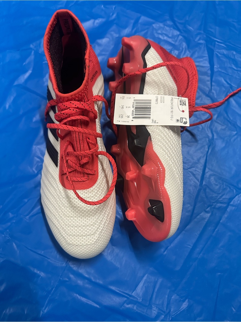 adidas White and Red Soccer Cleats with Black Stripes